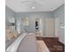 Comfortable main bedroom with large windows and natural light at 150 Pinnacle Shores Dr, Mooresville, NC 28117