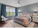 Comfortable main bedroom with large windows and natural light at 150 Pinnacle Shores Dr, Mooresville, NC 28117