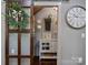Pantry with custom door and clock at 150 Pinnacle Shores Dr, Mooresville, NC 28117
