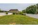 Expansive backyard featuring well-maintained grass and white picket fence at 1709 White Willow Ave, Gastonia, NC 28054