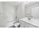 This bathroom features a tub/shower combo, sleek fixtures, and ample lighting at 1709 White Willow Ave, Gastonia, NC 28054