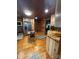 Wood kitchen equipped with stainless steel refrigerator and matching dining set at 200 Prospect Church Rd, Albemarle, NC 28001