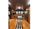 Kitchen featuring wood cabinets, hardwood floors, stainless steel appliances, and eat-in area at 200 Prospect Church Rd, Albemarle, NC 28001
