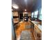 Well-lit kitchen featuring wood cabinets, countertops, and modern appliances at 200 Prospect Church Rd, Albemarle, NC 28001