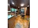Large kitchen with hardwood floors, custom cabinets, and modern appliances at 200 Prospect Church Rd, Albemarle, NC 28001