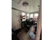 Mud room with laundry machine, storage racks, and natural light from windows at 200 Prospect Church Rd, Albemarle, NC 28001