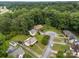 Arial view of neighborhood homes surrounded by large trees, driveways, and sidewalks at 216 Hillcrest Pl, Salisbury, NC 28144