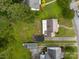 Aerial view of homes with big yards, driveways, and tall trees around them at 216 Hillcrest Pl, Salisbury, NC 28144