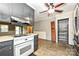 Efficient kitchen space features smooth transitions to storage spaces and open dining at 267 Buffalo Nw Ave, Concord, NC 28025
