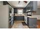 A spacious kitchen features updated appliances and ample storage and countertop space at 267 Buffalo Nw Ave, Concord, NC 28025