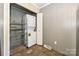 Convenient laundry area with washer, dryer and shelving for organized storage at 267 Buffalo Nw Ave, Concord, NC 28025