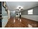 Open living room featuring hardwood floors, neutral paint, and abundant natural light at 267 Buffalo Nw Ave, Concord, NC 28025