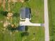 Overhead shot of property highlighting home layout, garage, and surrounding greenery at 2737 Bobcat Rd, Heath Springs, SC 29058