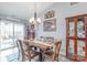 Inviting dining room features a rustic wood table, backyard access, and stylish decor for memorable gatherings at 2737 Bobcat Rd, Heath Springs, SC 29058