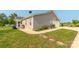 Side view of the home showcasing well-manicured lawn and access to the garage at 2737 Bobcat Rd, Heath Springs, SC 29058