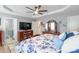 This bedroom features a tray ceiling, ceiling fan, carpet and TV at 2737 Bobcat Rd, Heath Springs, SC 29058