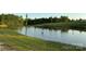 Scenic view of a tranquil pond surrounded by lush greenery and a peaceful atmosphere at 2737 Bobcat Rd, Heath Springs, SC 29058