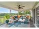 This porch has a covered patio with comfortable outdoor seating and nature views at 2737 Bobcat Rd, Heath Springs, SC 29058