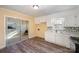Stylish kitchen featuring white cabinets, granite countertops, and modern stainless steel appliances, perfect for cooking at 2809 Markland Dr, Charlotte, NC 28208