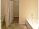 Bright bathroom showing a separate tub, shower, and walk-in closet at 3014 Green Apple Dr, Dallas, NC 28034