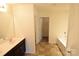 Modern bathroom featuring double vanity and a tub at 3014 Green Apple Dr, Dallas, NC 28034