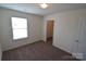 Cozy bedroom with carpet floors, white walls, a window, and closet at 3014 Green Apple Dr, Dallas, NC 28034