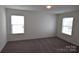 Neutral bedroom with 2 windows that provide natural light at 3014 Green Apple Dr, Dallas, NC 28034