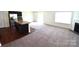 Open-concept kitchen and living room area perfect for entertaining and relaxing at 3014 Green Apple Dr, Dallas, NC 28034