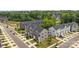 Aerial view showing townhomes with nice landscaping, providing a desirable neighborhood at 3108 Beeler Ln, Charlotte, NC 28208