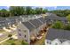 View of multiple townhomes featuring decks, patios and lawns at 3108 Beeler Ln, Charlotte, NC 28208