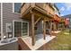 Backyard patio with sliding glass door, and space for entertaining at 3108 Beeler Ln, Charlotte, NC 28208
