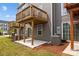 Exterior view of deck and patio for outdoor entertaining and relaxing on the lawn at 3108 Beeler Ln, Charlotte, NC 28208
