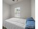 Bedroom with a simple window and comfy bed at 3108 Beeler Ln, Charlotte, NC 28208