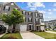 Beautiful townhome with a garage and well-maintained landscaping at 3108 Beeler Ln, Charlotte, NC 28208