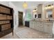 Elegant bathroom featuring double vanities, a walk-in shower, and stylish fixtures, creating a luxurious experience at 315 Mountainview Dr, Charlotte, NC 28270