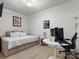 Office space featuring a day bed, computer, desk and shelf, providing a functional and stylish setup at 315 Mountainview Dr, Charlotte, NC 28270
