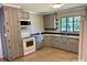 Well-maintained kitchen with granite countertops, new white appliances and ample cabinet space in a functional layout at 3217 Celanese Rd, Rock Hill, SC 29732