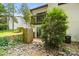 Two-story home featuring a private yard, patio access, and charming balcony at 3737 Winding Creek Ln, Charlotte, NC 28226