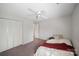 Bright bedroom with a ceiling fan, large closet, and neutral color palette at 3737 Winding Creek Ln, Charlotte, NC 28226