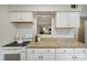 Well-lit kitchen featuring granite countertops and white appliances at 3737 Winding Creek Ln, Charlotte, NC 28226