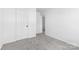 Bedroom features neutral walls and carpet and two closets at 4208 Coulter Xing, Charlotte, NC 28213