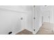 Bright laundry area with shelves, connections, and a door to the exterior at 4208 Coulter Xing, Charlotte, NC 28213