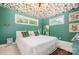 Bedroom with colorful ceiling, built-in shelves, and natural light at 4232 Randolph Rd, Charlotte, NC 28211