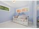 Bedroom featuring built-in daybed and ample natural light at 4232 Randolph Rd, Charlotte, NC 28211
