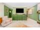 Inviting living room with trendy decor, green walls, and an open layout at 4232 Randolph Rd, Charlotte, NC 28211