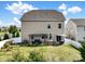 Large backyard featuring a kitchen area, dining area, and lounging under a pergola at 4310 Coachwhip Ave, Lancaster, SC 29720
