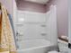 Clean bathroom features a white tub and shower combination with built-in shelving and essential fixtures at 4310 Coachwhip Ave, Lancaster, SC 29720