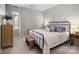 Bedroom with wrought iron bed frame and bench at 4310 Coachwhip Ave, Lancaster, SC 29720