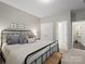 Bedroom with metal bed frame and attached bath at 4310 Coachwhip Ave, Lancaster, SC 29720