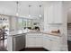 Bright and modern kitchen with granite countertops, stainless steel appliances, and open-concept layout at 4310 Coachwhip Ave, Lancaster, SC 29720